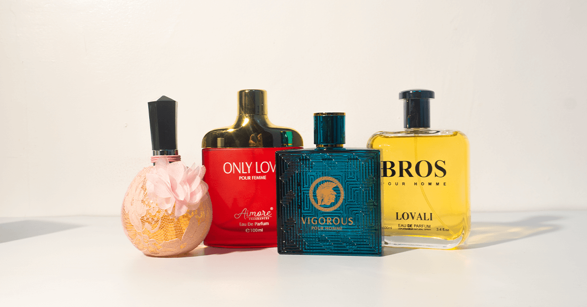 Collection of Akrymi perfumes including Only Love, Vigorous Pour Homme, Bros Pour Homme, and a floral-themed fragrance bottle.